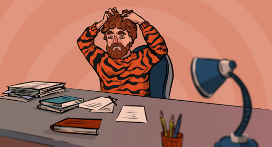 guy in a tiger sweater is sitting at his desk stressed about his homework