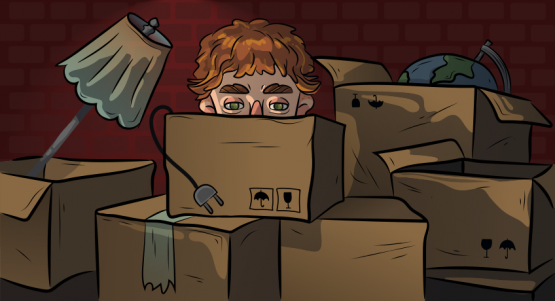 a guy is sitting among boxes