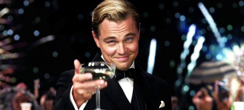 leonardo dicaprio raising a glass in great gatsby movie