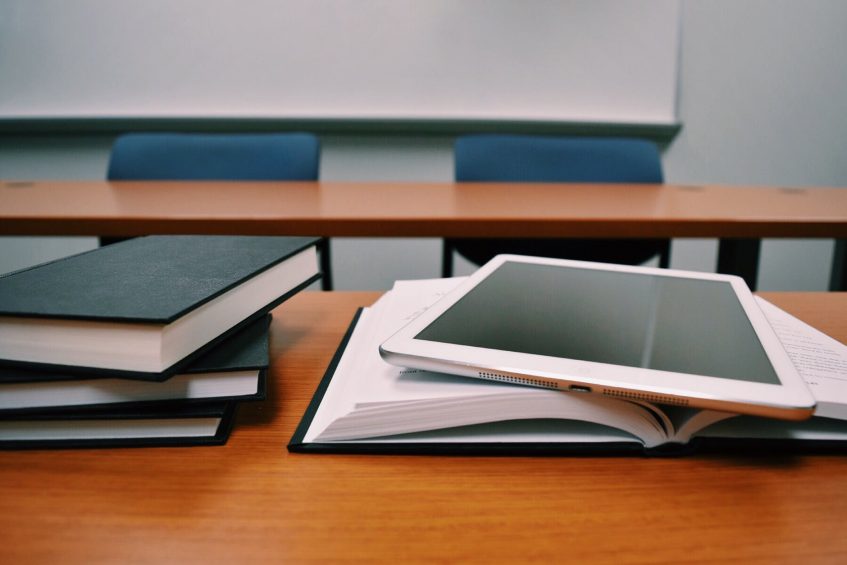 books and a tablet