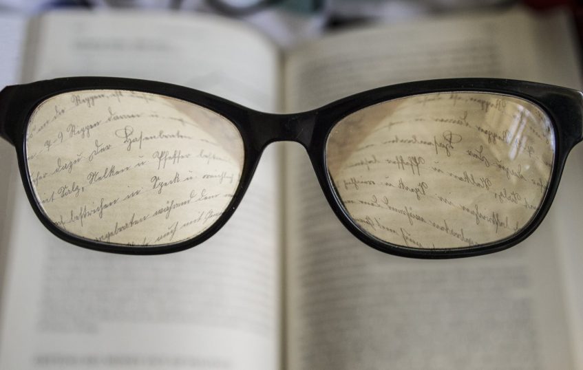 written words seen through the glasses