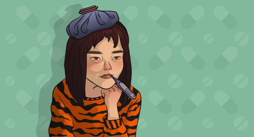 a girl in a tiger sweater is sick and sitting with a thermometer in her mouth