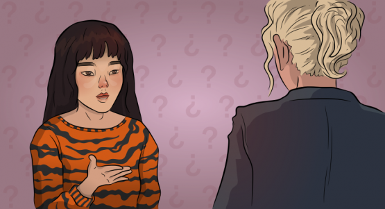 a girl in a tiger sweater is talking to an academic adviser