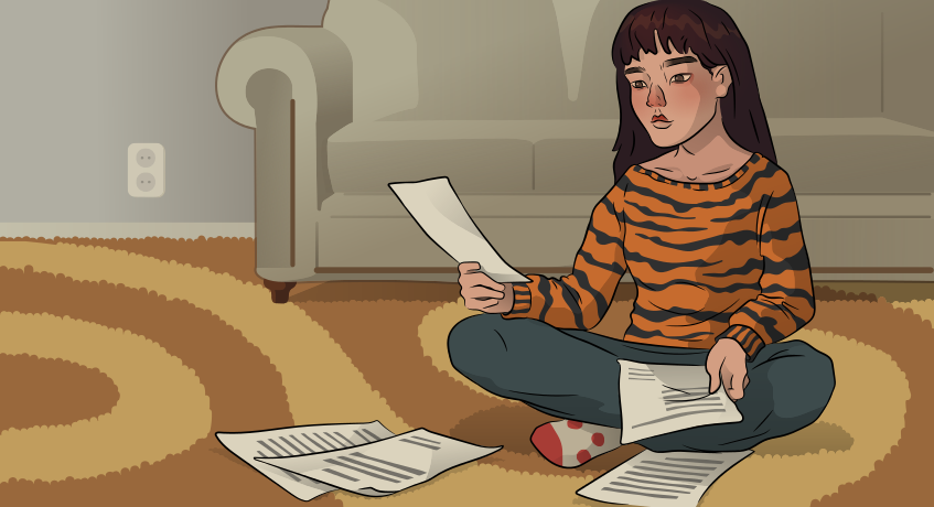 a girl in a tiger sweater is looking through the papers